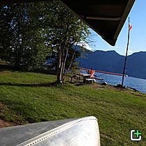 Nahanni Mountain Lodge cabin lawn